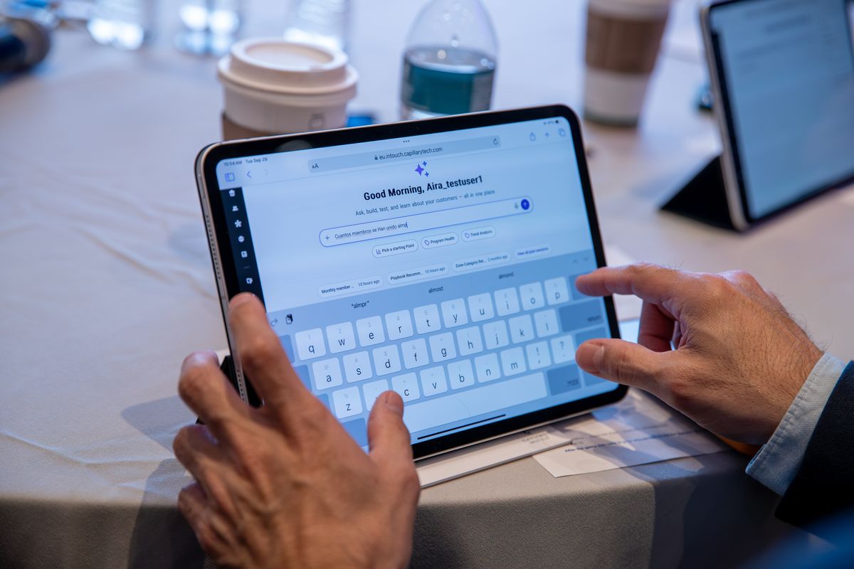 An attendee typing a question into aiRA on an iPad